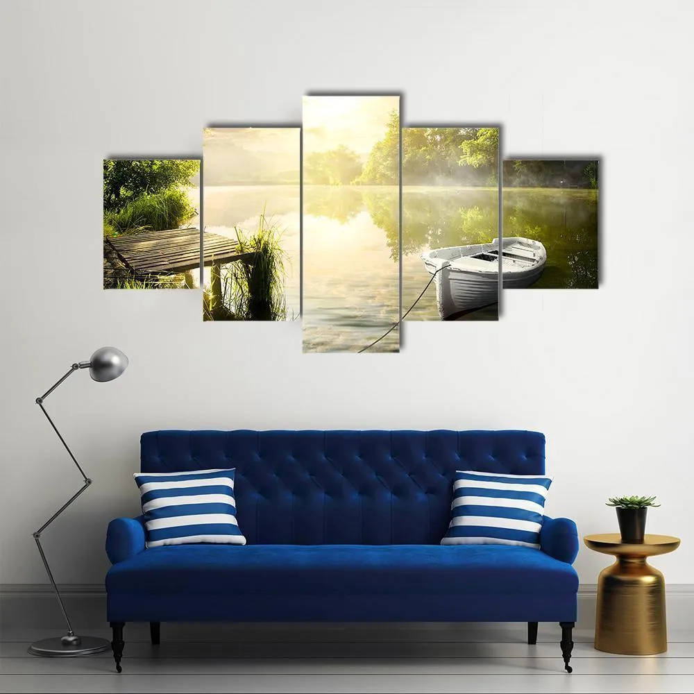 Boat On River Bank Canvas Wall Art