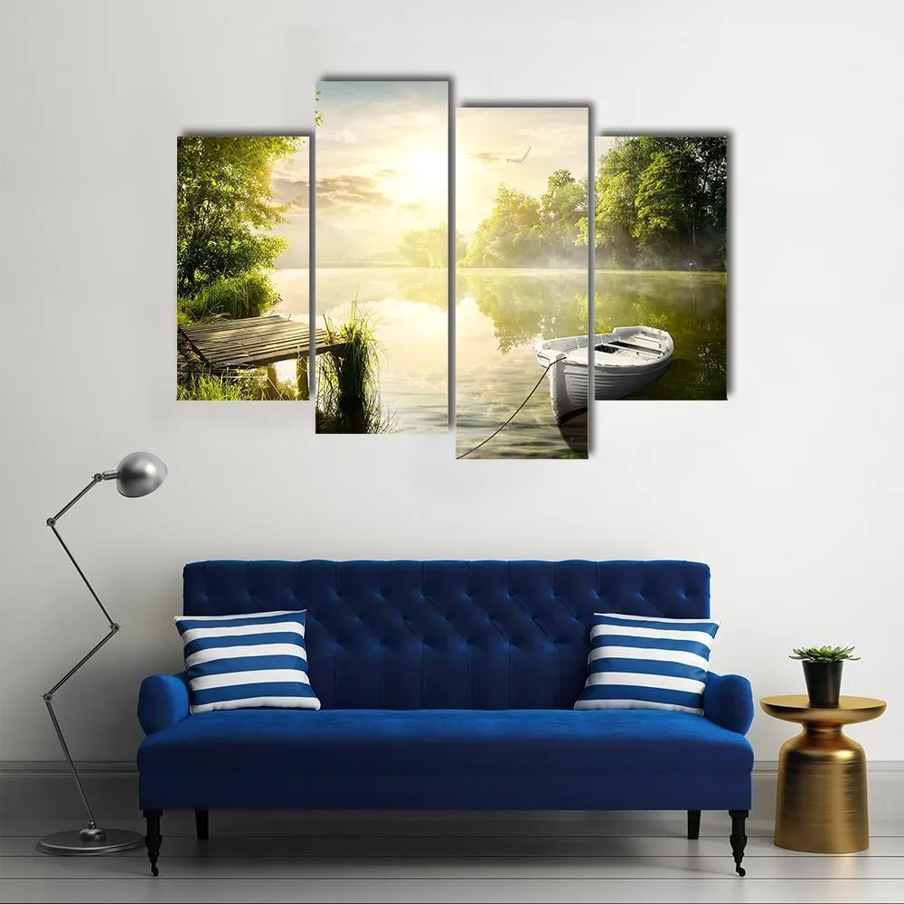 Boat On River Bank Canvas Wall Art