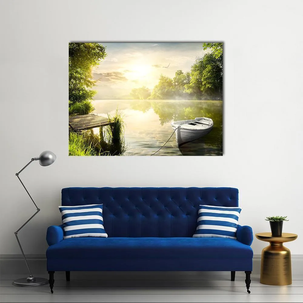 Boat On River Bank Canvas Wall Art