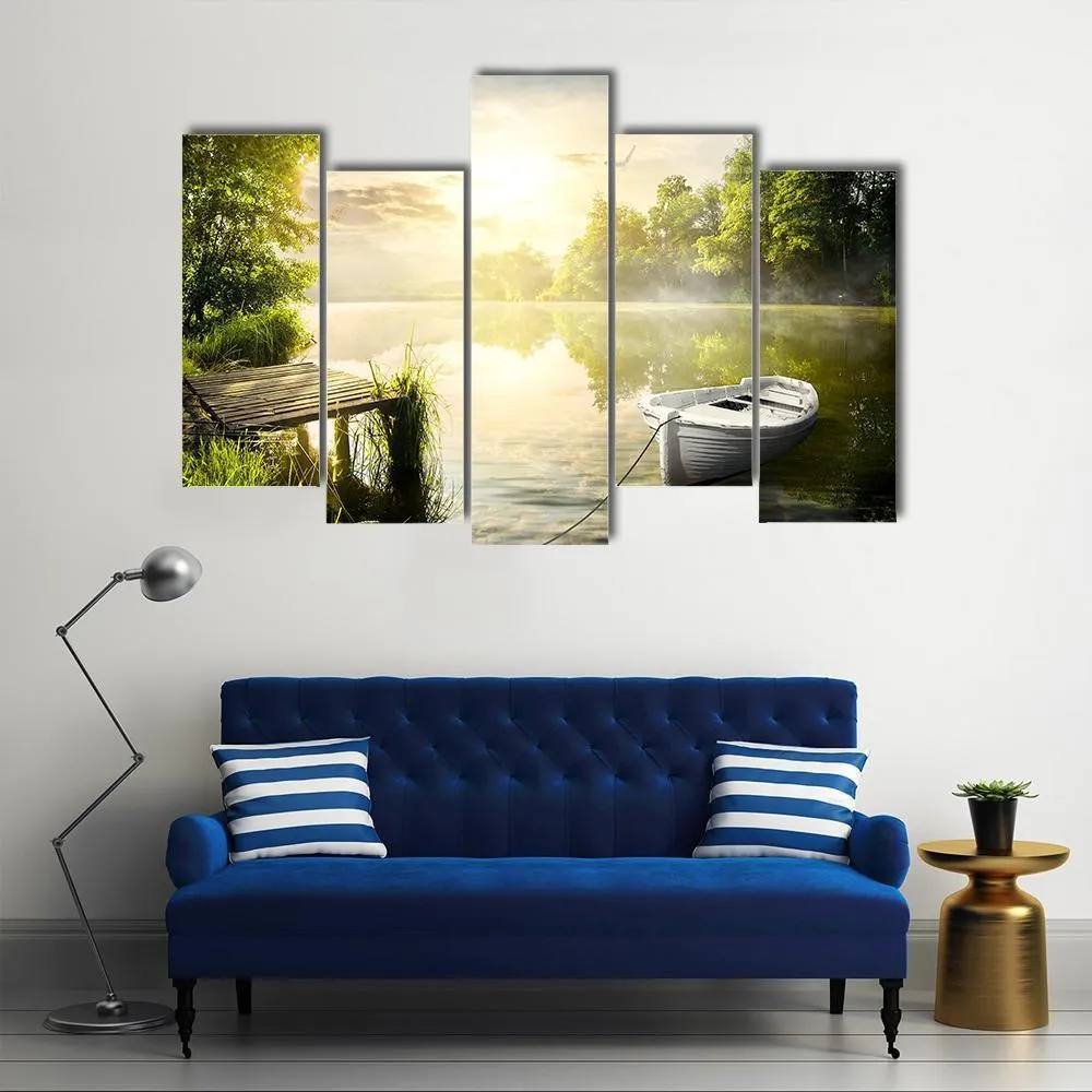 Boat On River Bank Canvas Wall Art