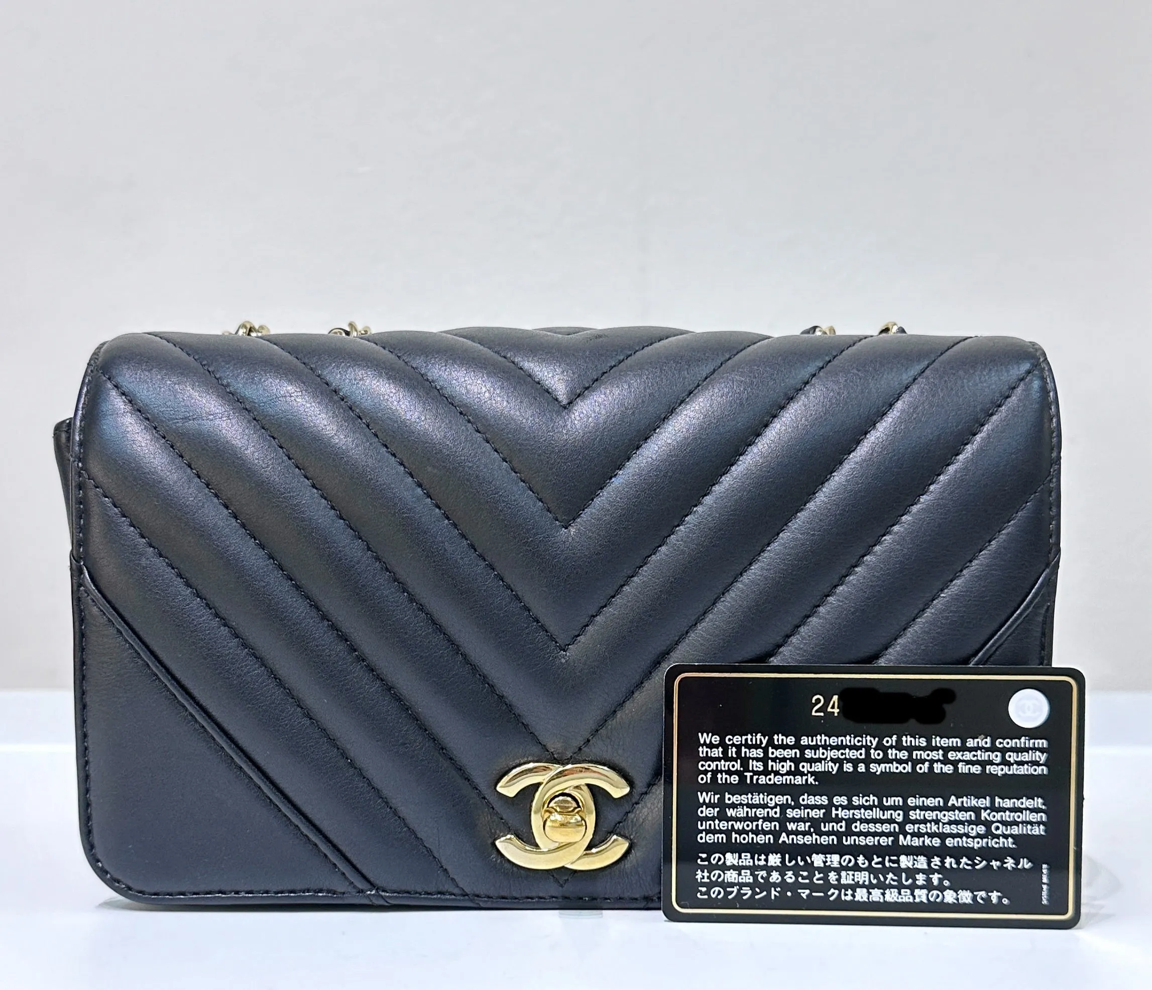 CHANEL Calfskin Chevron Quilted Mini Statement Flap Black