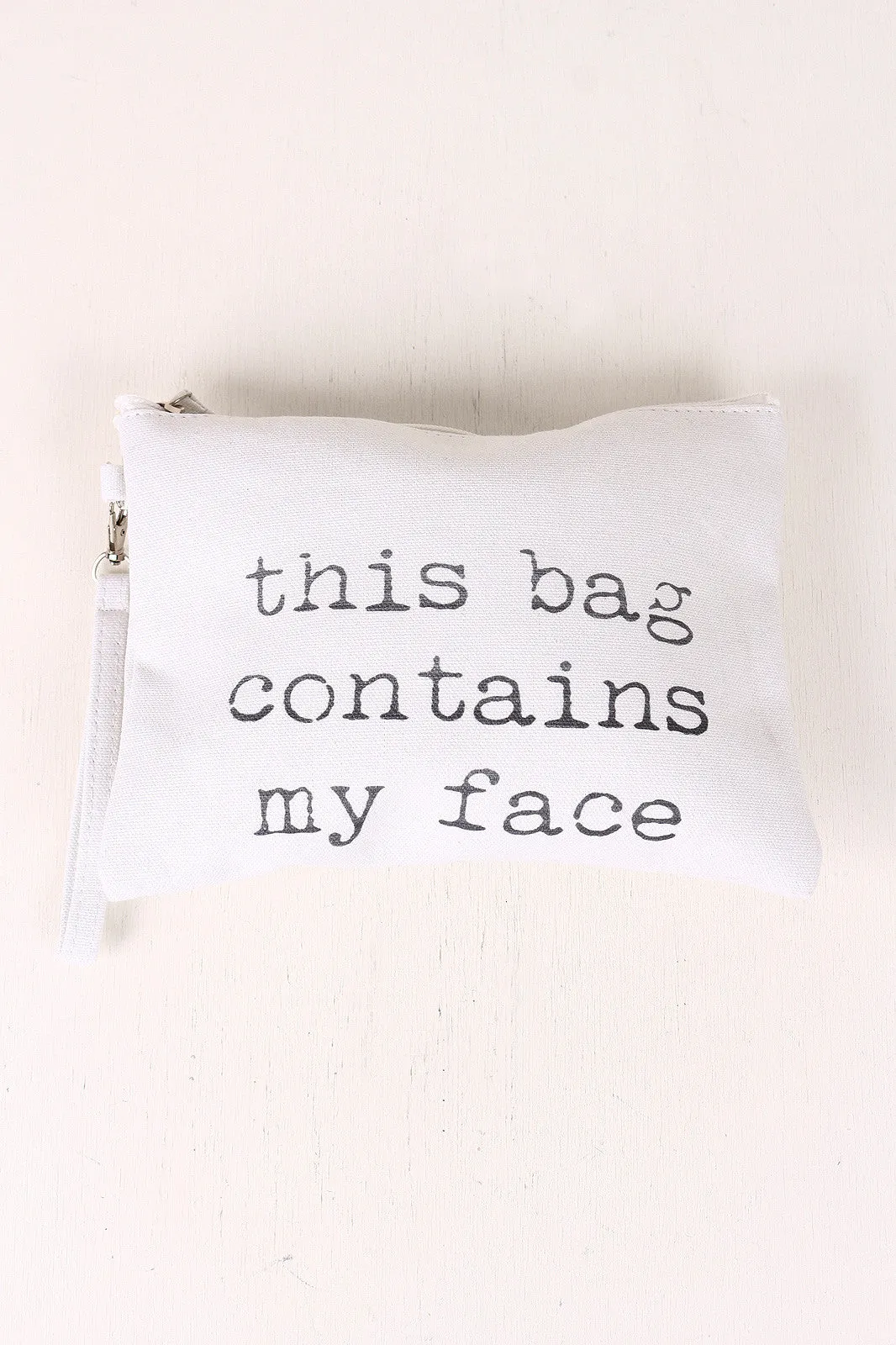 This Bag Contains My Face Canvas Clutch